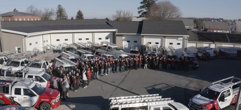 BGone team photo taken outside of main office buidling.