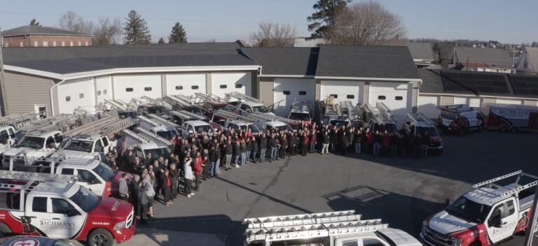 BGone team photo taken outside of main office buidling.